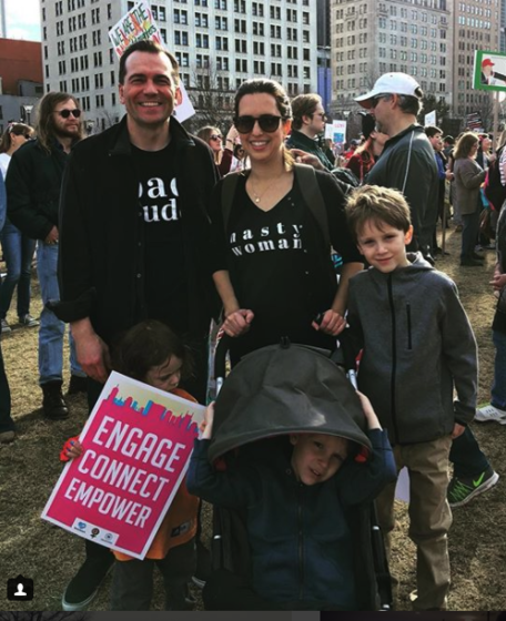 John Ray Clemmons poses for a picture with his wife and 3 children at the Nashville Women's March.